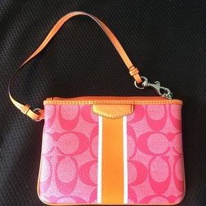Coach Wristlet Orange and Pink in Signature Canvas